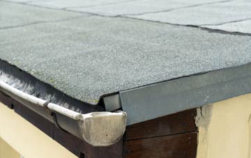 repair or replace Troopers Inn flat roofing?